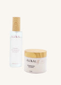 Two All AA skincare products with wooden caps on a white background